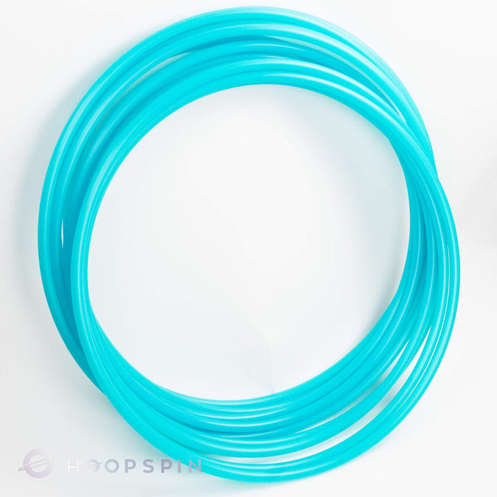 Aqua seaglass, blue polypro hula hoop tubing on white background