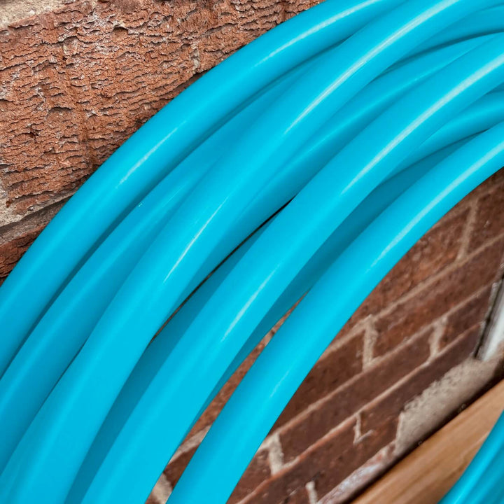 Aqua Seaglass hula hoop polypro against brick wall