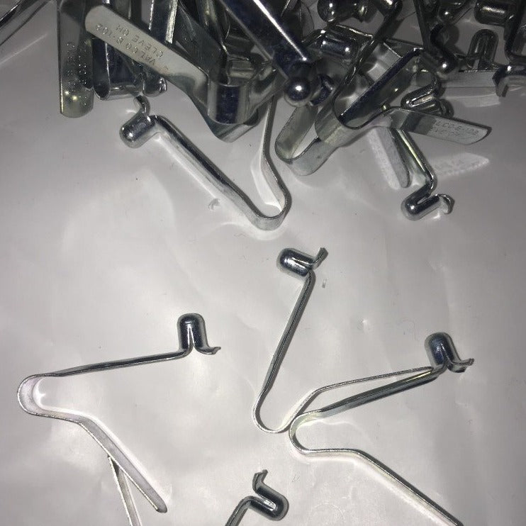 PushPile of metal push buttons to connector travel hula hoops 