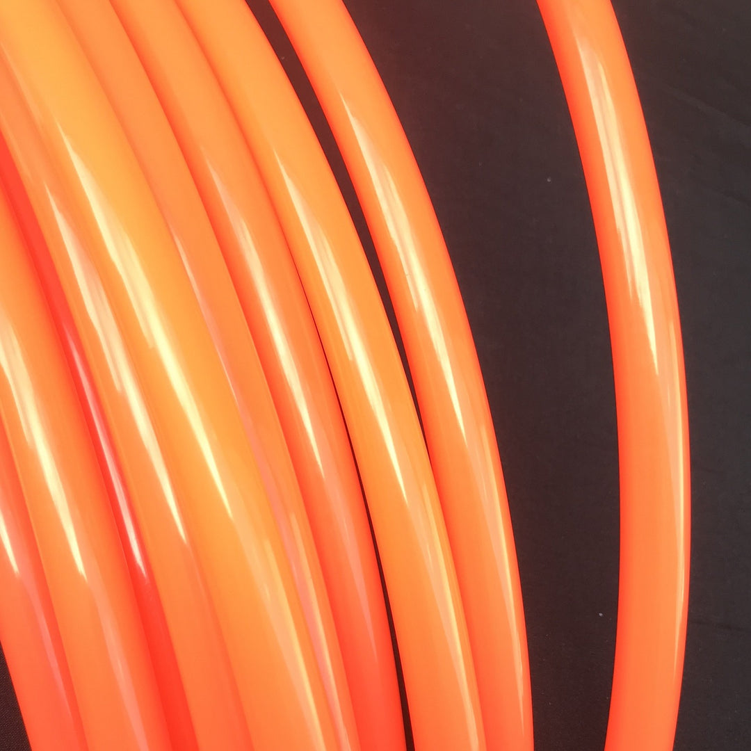 Solar Orange UV gloss tubing. Polypro UV Orange hoop for making hula hoops