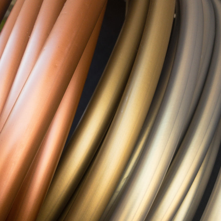 Metallic Polypro Hula hoops in Champagne gold, copper and , cryptic egyptian. 